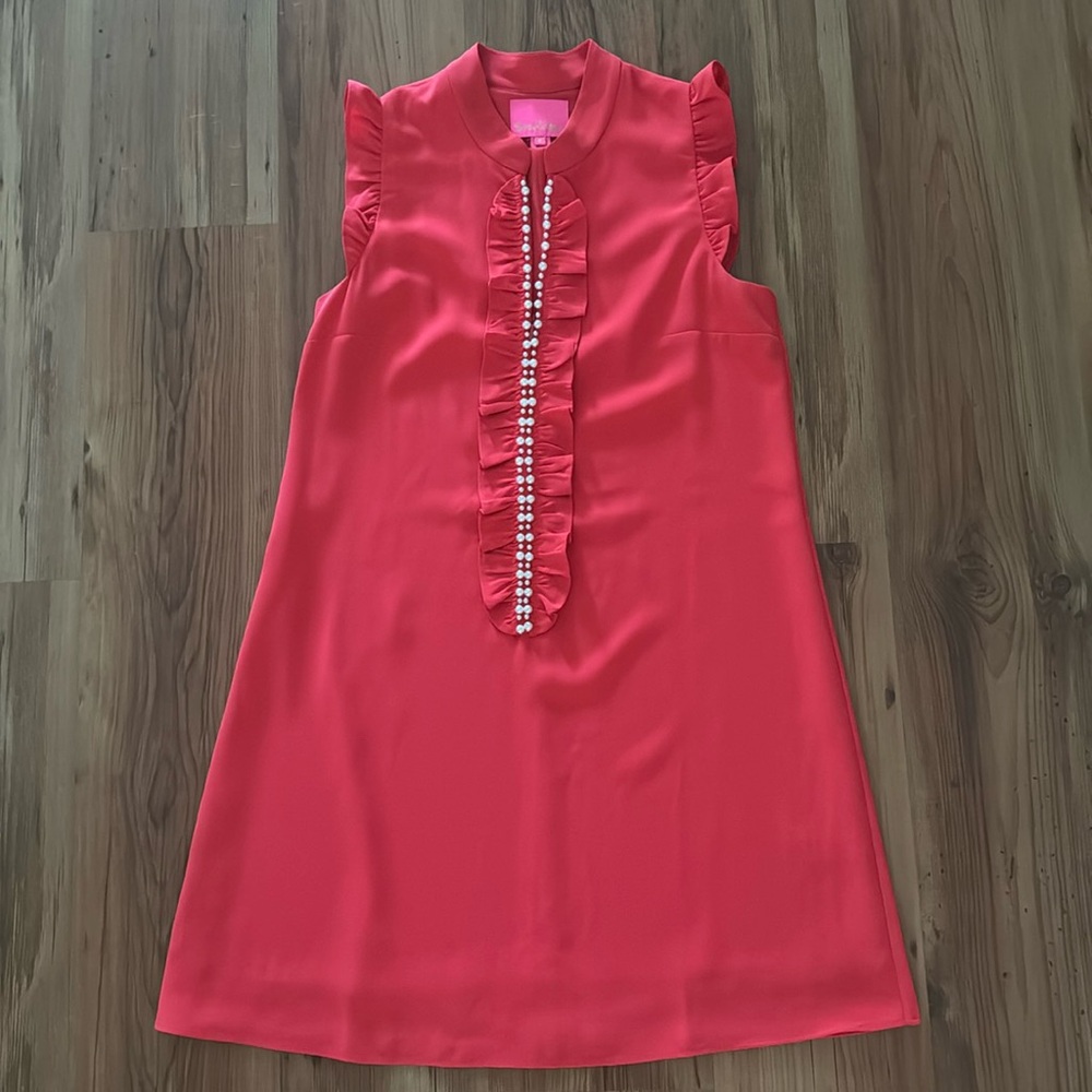 Lilly Pulitzer Dress with pearl, ruffle and zipper details.